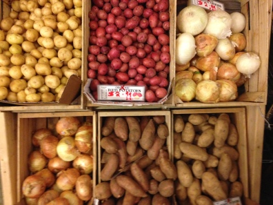 Potatoes and onions at Union Market